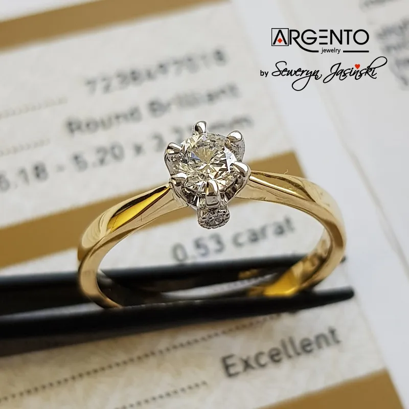 P089 Złoty pierścionek z diamentami